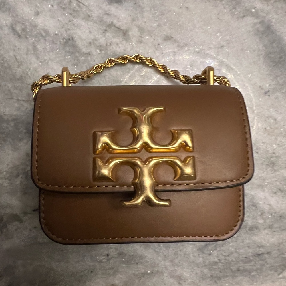 Tory Burch mini crossbody w gold chain.